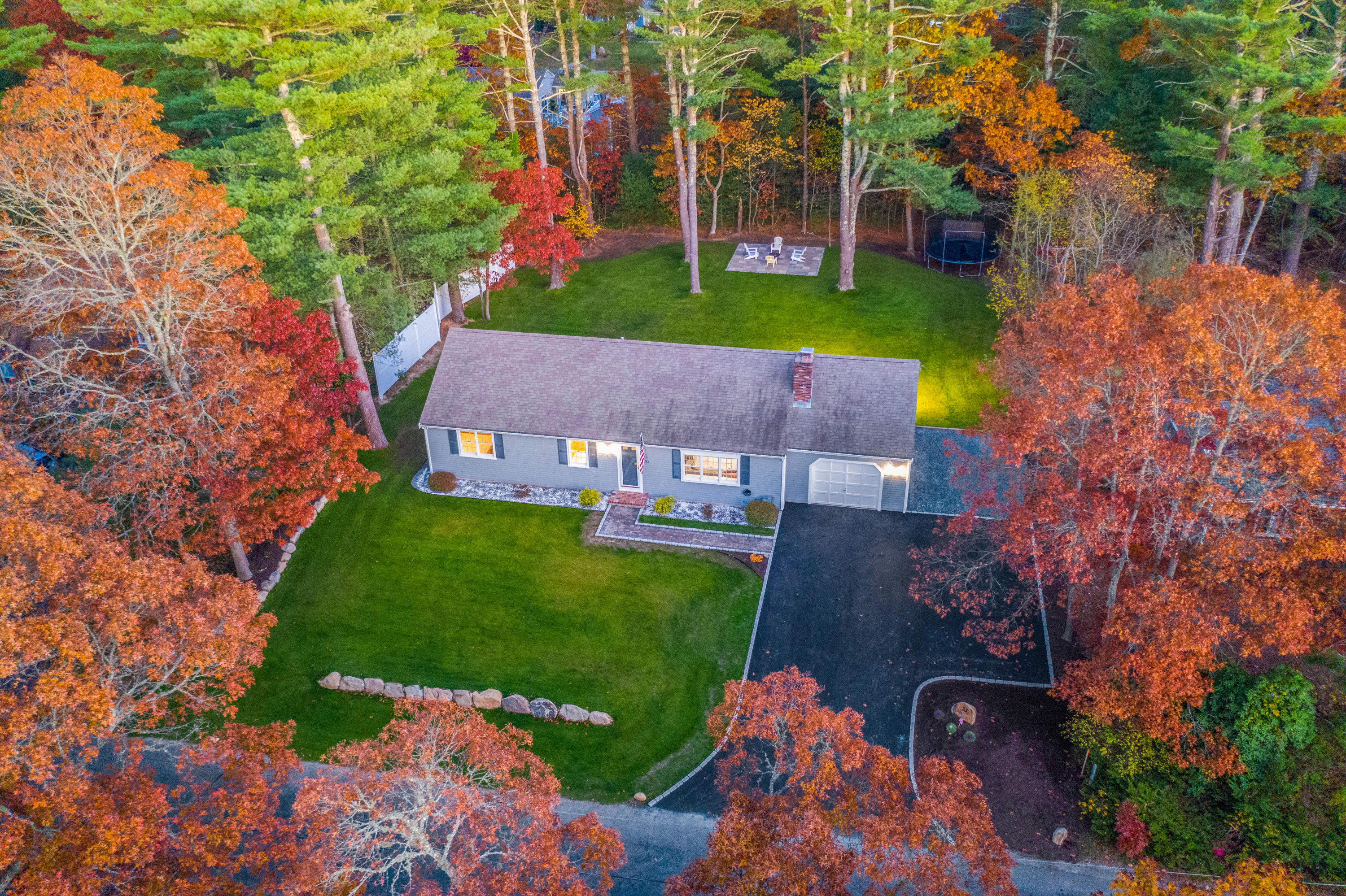 33 Cedric Road Centerville, MA 02632 - Photo 3 of 38 front view of a house with a yard