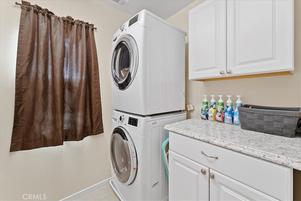 10969 Elkwood Circle Riverside, CA 92503 - Photo 28 of 42 a utility room with dryer and washer