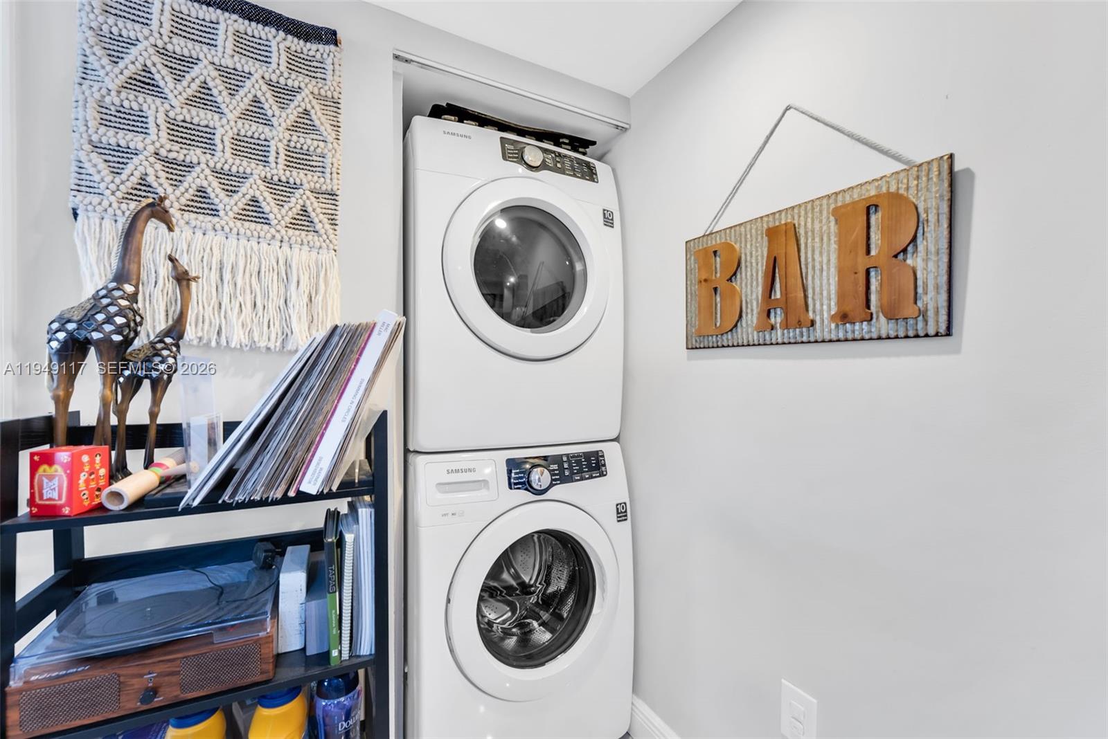 7858 Southwest 102nd Lane Miami, FL 33156 - Photo 15 of 22 a utility room with dryer and washer