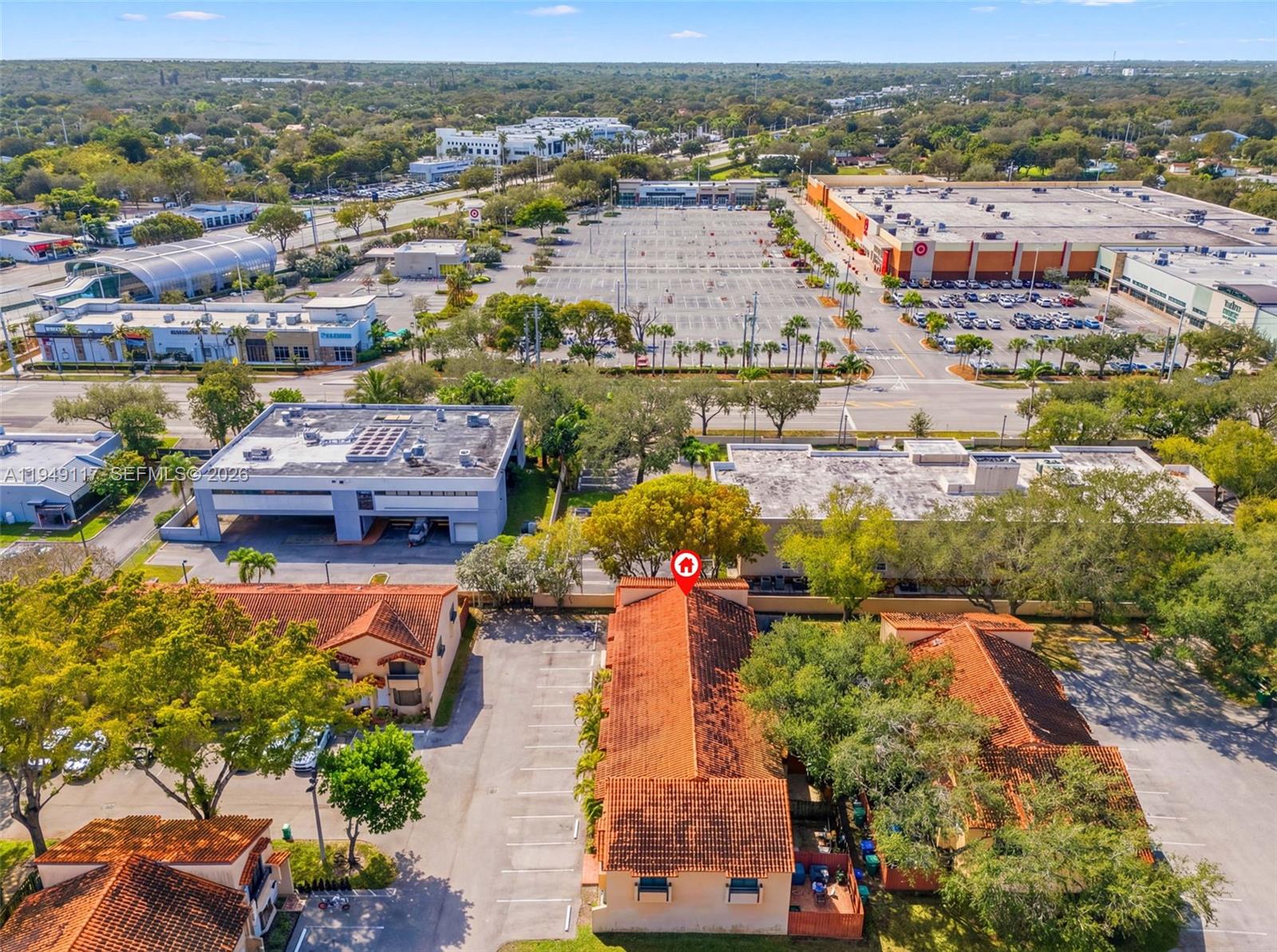 7858 Southwest 102nd Lane Miami, FL 33156 - Photo 18 of 22 an aerial view of a houses with a lake view
