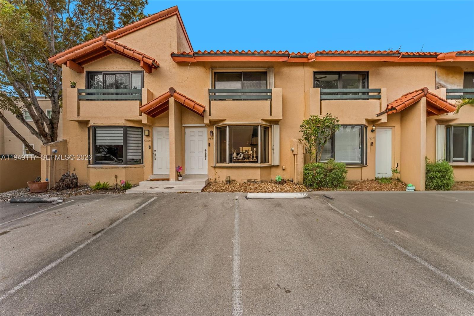 7858 Southwest 102nd Lane Miami, FL 33156 - Photo 2 of 22 front view of a house