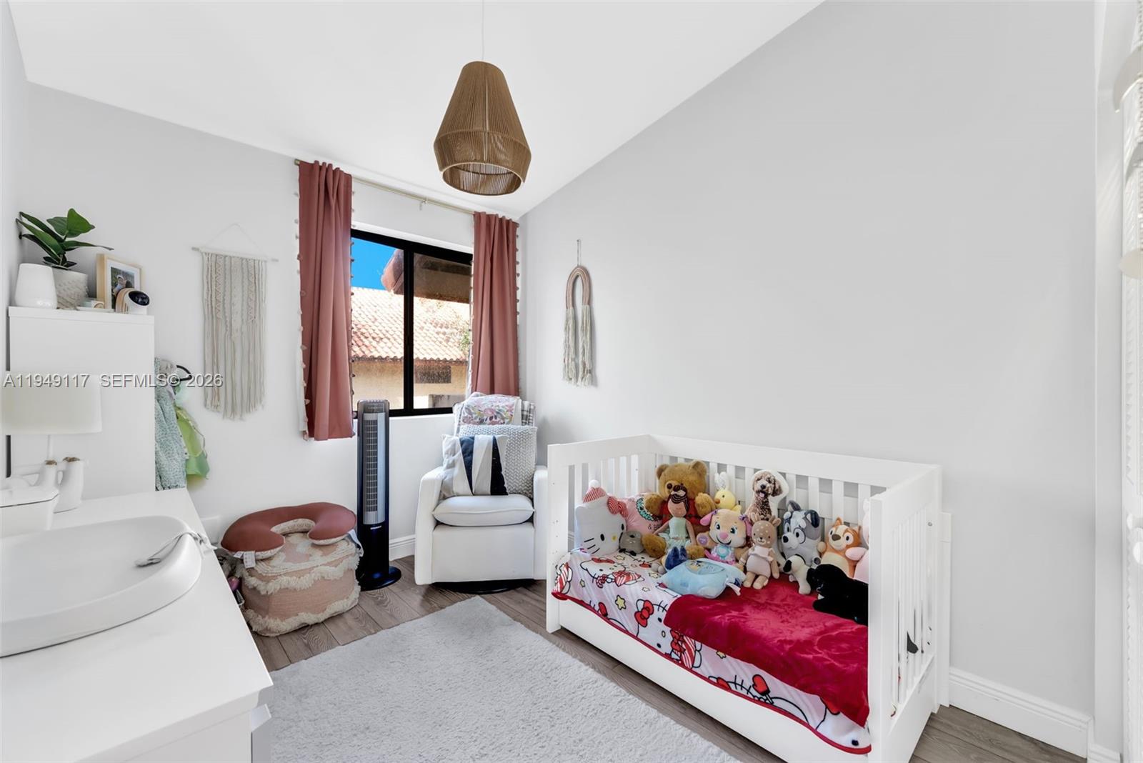 7858 Southwest 102nd Lane Miami, FL 33156 - Photo 6 of 22 a living room with furniture and a large window