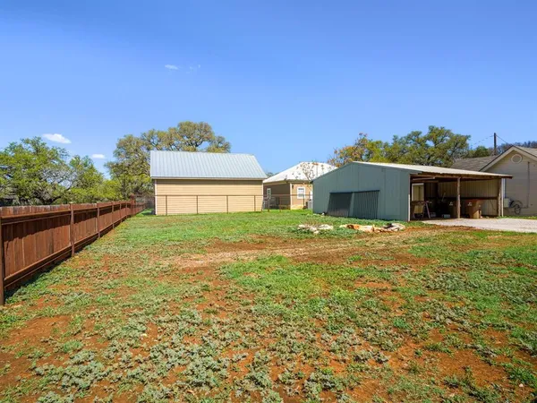 a house view with a garden space