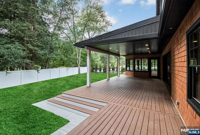 a view of backyard with green space