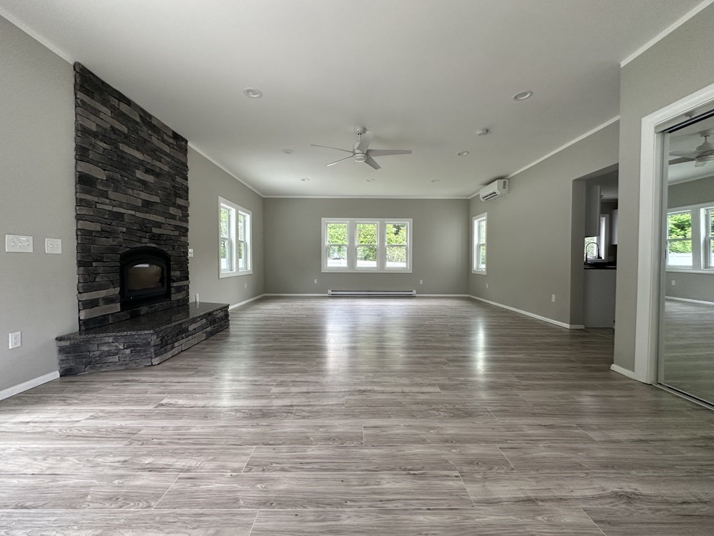 26 Worthington Road Huntington, MA 01050 - Photo 11 of 25 a view of empty room with window and fireplace