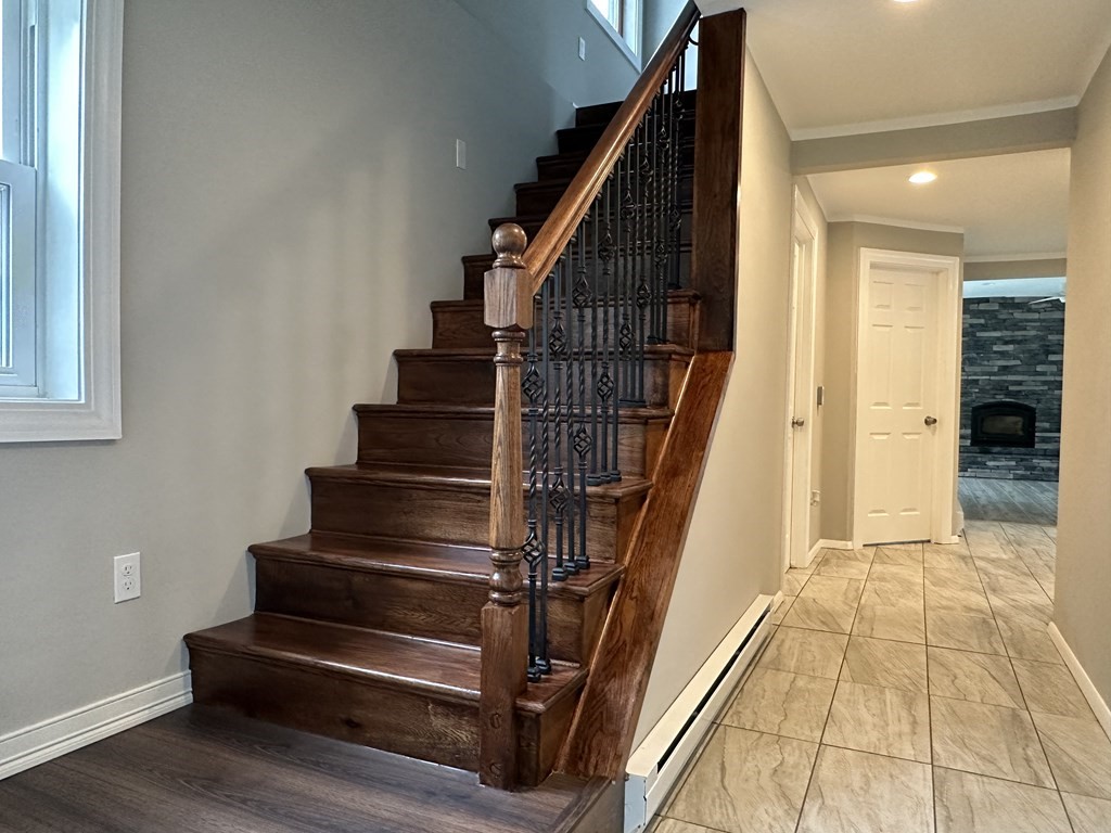 26 Worthington Road Huntington, MA 01050 - Photo 20 of 25 a view of entryway with wooden floor and stairs