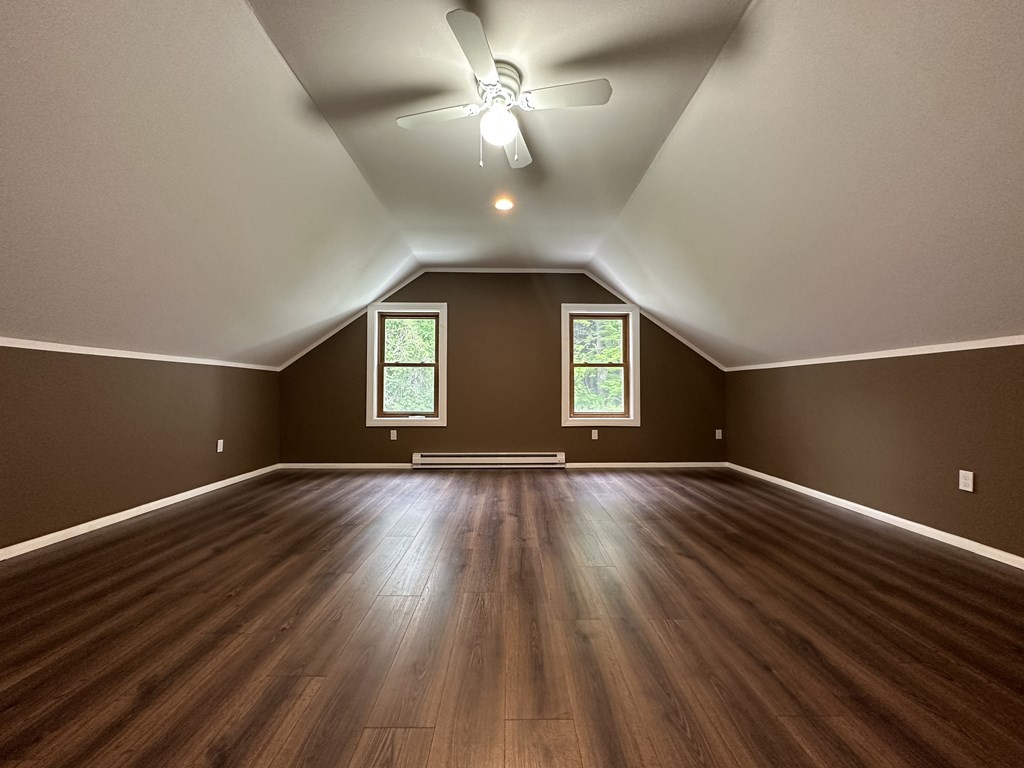 26 Worthington Road Huntington, MA 01050 - Photo 21 of 25 wooden floor in an empty room with a window