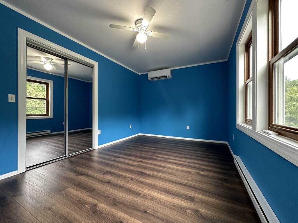 26 Worthington Road Huntington, MA 01050 - Photo 24 of 25 wooden floor in an empty room with a window