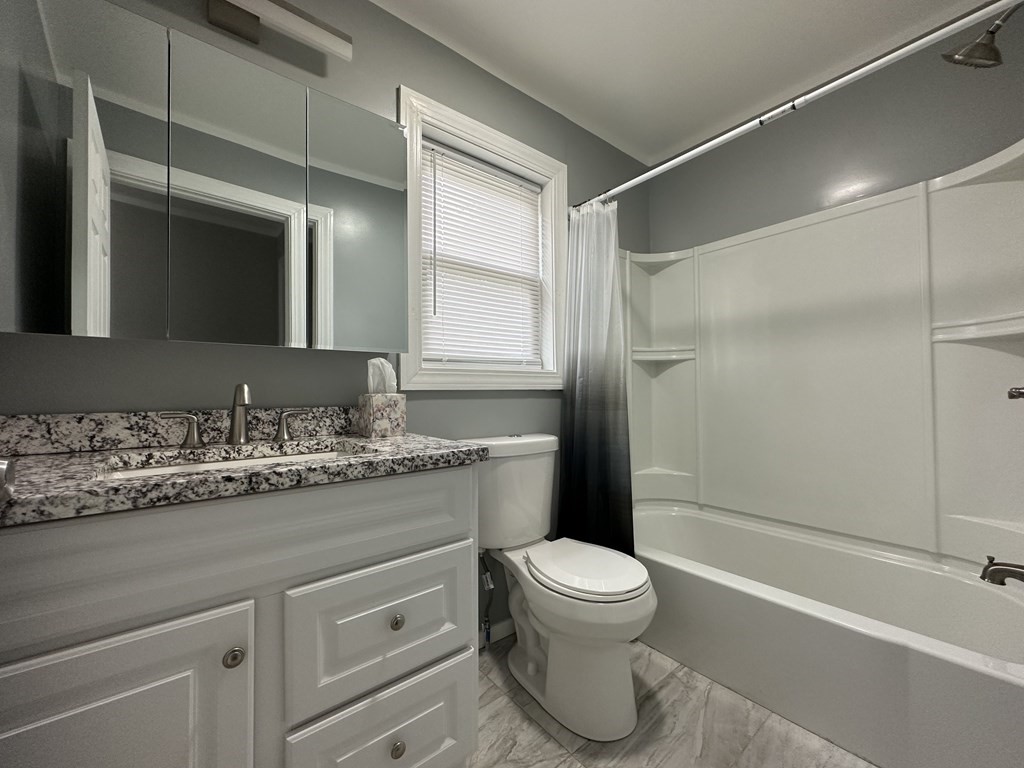 26 Worthington Road Huntington, MA 01050 - Photo 25 of 25 a bathroom with a granite countertop sink toilet and shower