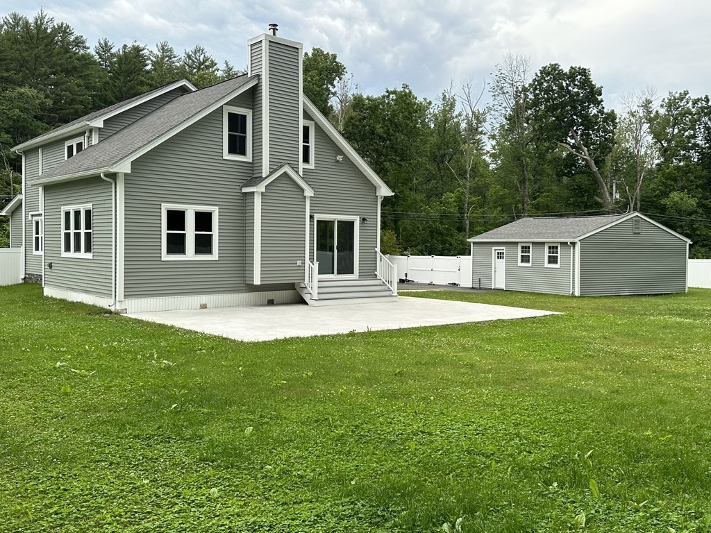 26 Worthington Road Huntington, MA 01050 - Photo 9 of 25 a front view of a house with yard