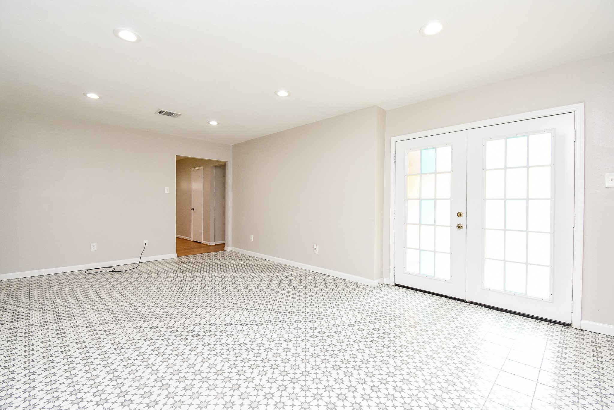 7901 Ridgeview Drive Houston, TX 77055 - Photo 15 of 37 wooden floor in an empty room with a window