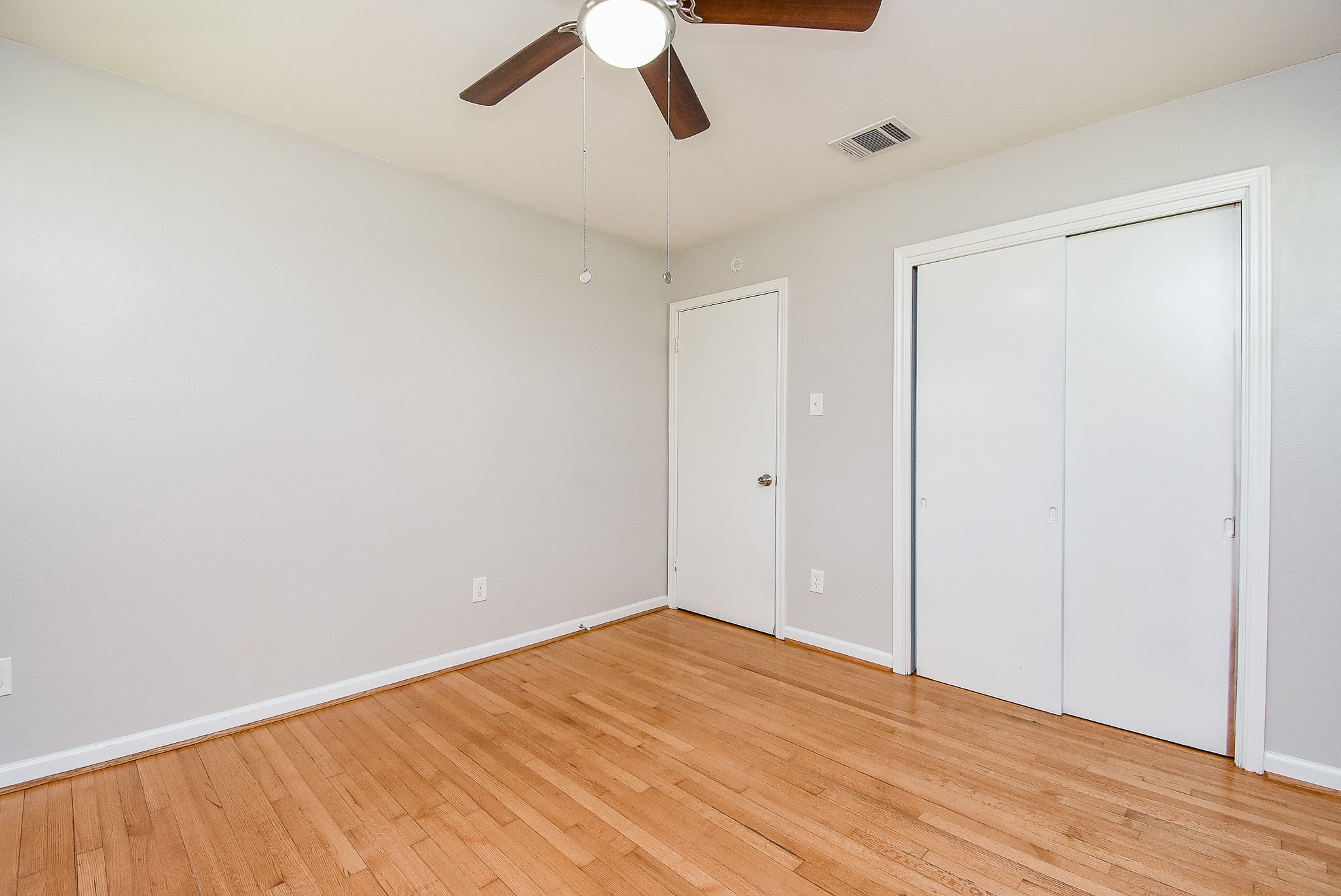 7901 Ridgeview Drive Houston, TX 77055 - Photo 20 of 37 wooden floor in an empty room