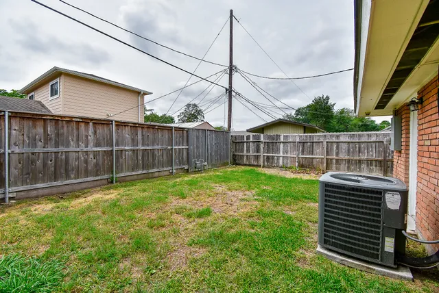 a view of a backyard with a garden