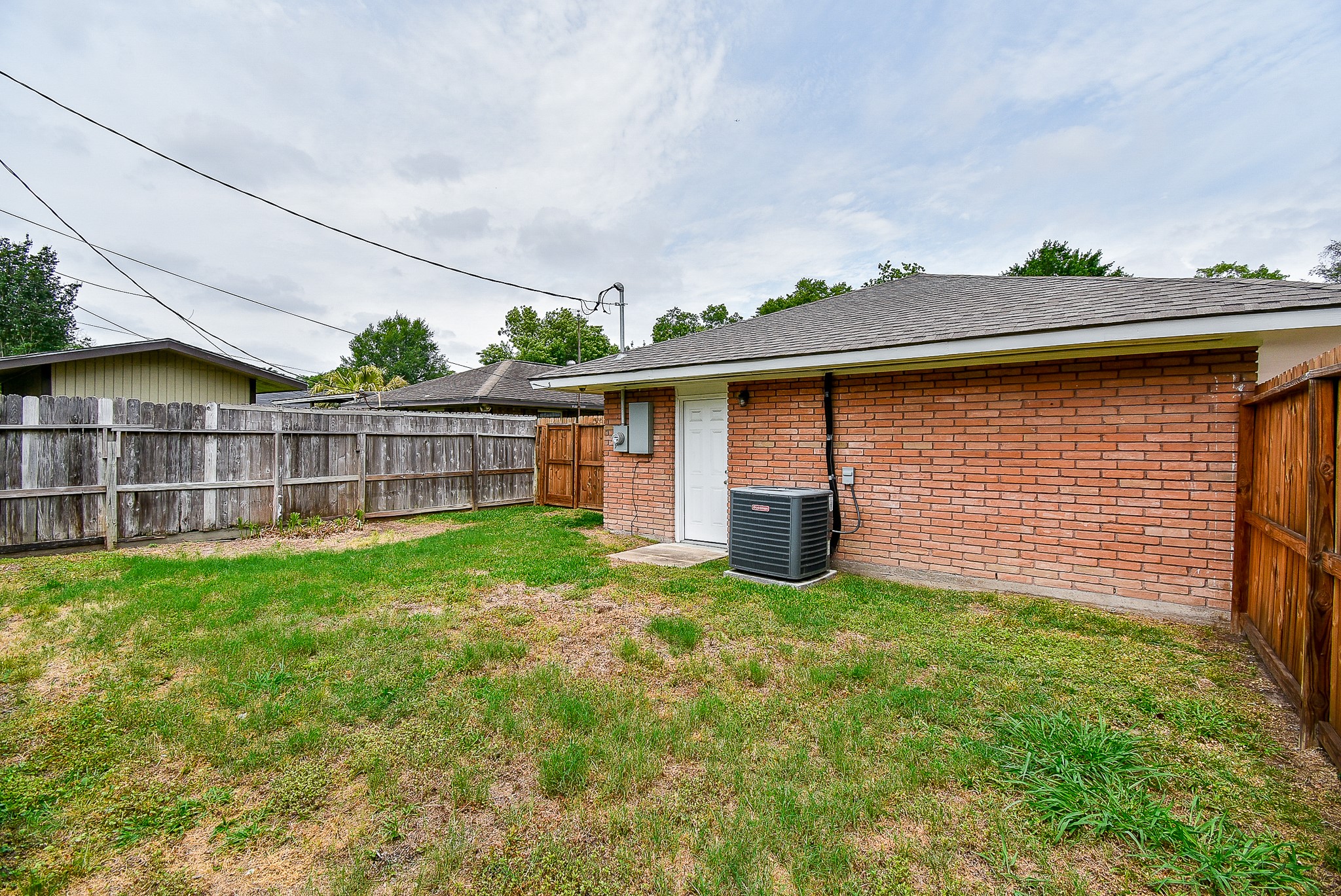 7901 Ridgeview Drive Houston, TX 77055 - Photo 28 of 37 a view of a porch with a yard