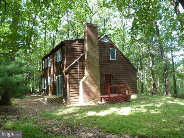 159 Leppo Road Westminster, MD 21158 - Photo 1 of 30 What a Setting! Trees! Ferns! Flowers! Privacy