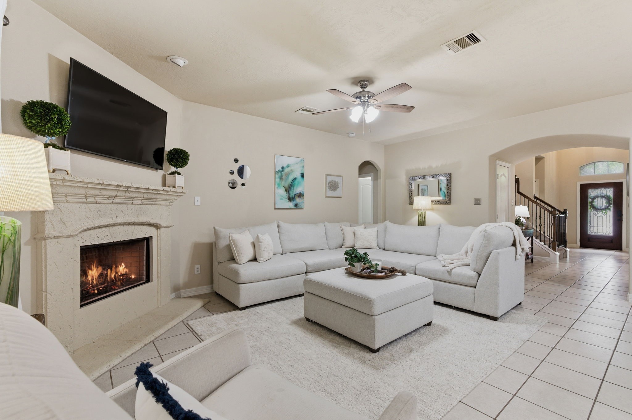 1737 Round Oak Lane Conroe, TX 77304 - Photo 6 of 39 The spacious family room is filled with natural light and designed for effortless everyday living and entertaining.
