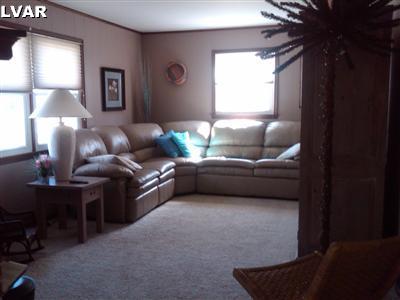 3409 Bridlepath Road Easton, PA 18045 - Photo 6 of 19 Family room with the seating set to enjoy the fire