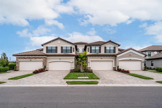 a view of a swimming pool with an ocean view