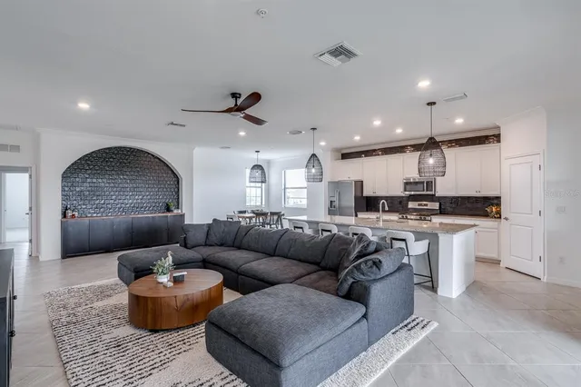 a kitchen with sink cabinets and stove