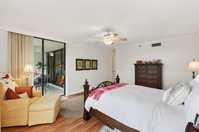 a bedroom with a bed furniture and a window
