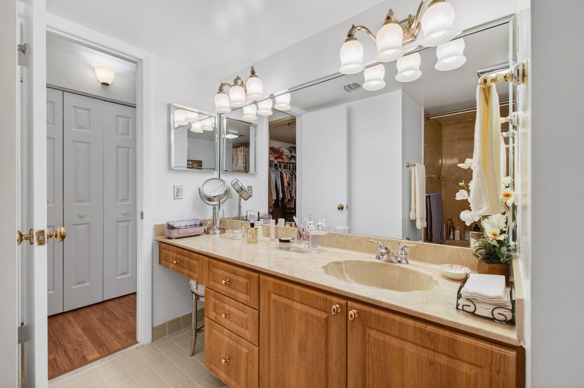 6562 Boca Del Mar Drive, Unit 326 Boca Raton, FL 33433 - Photo 15 of 25 a bathroom with a sink vanity and a mirror