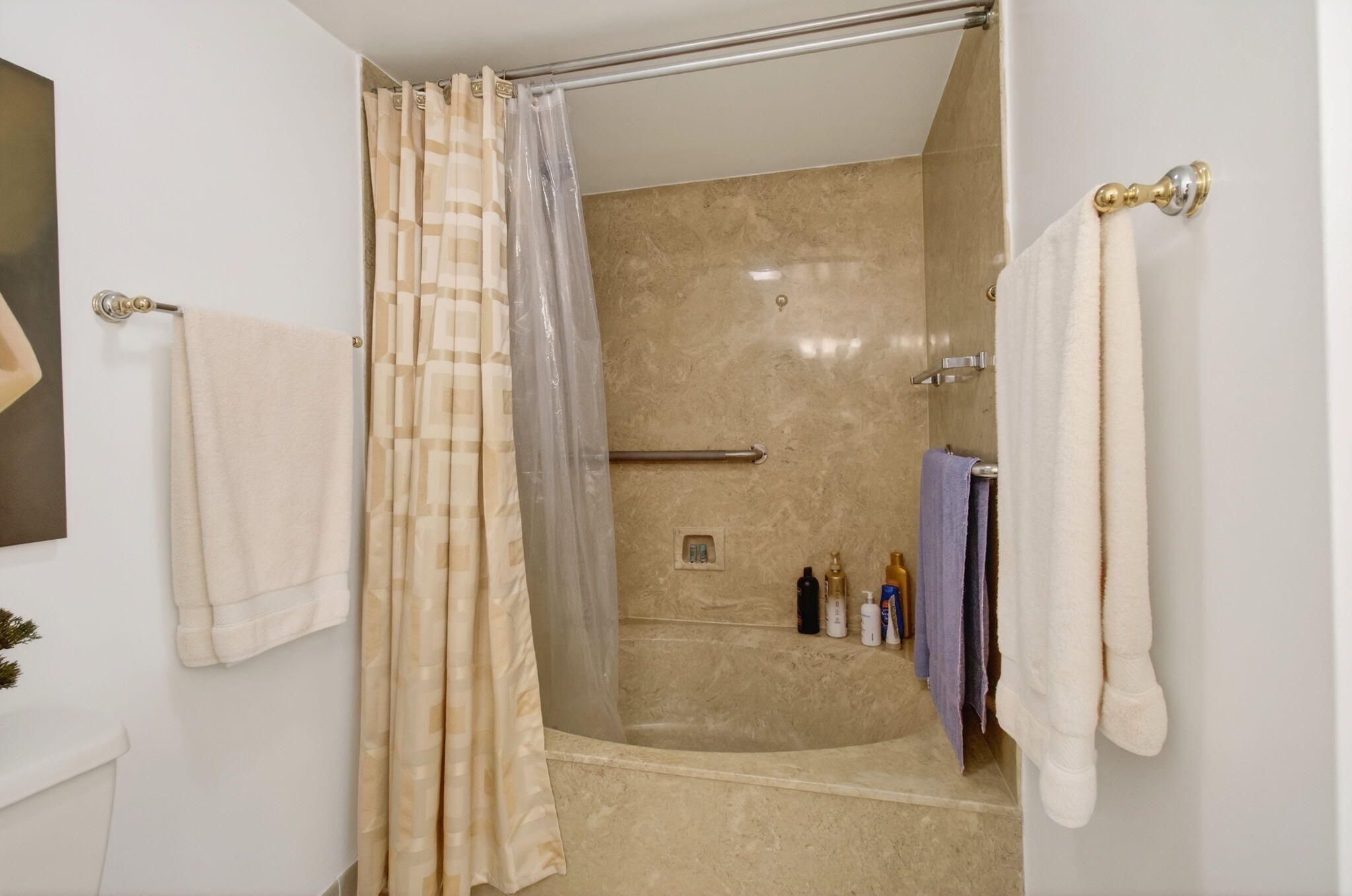 6562 Boca Del Mar Drive, Unit 326 Boca Raton, FL 33433 - Photo 16 of 25 a bathroom with a glass shower door