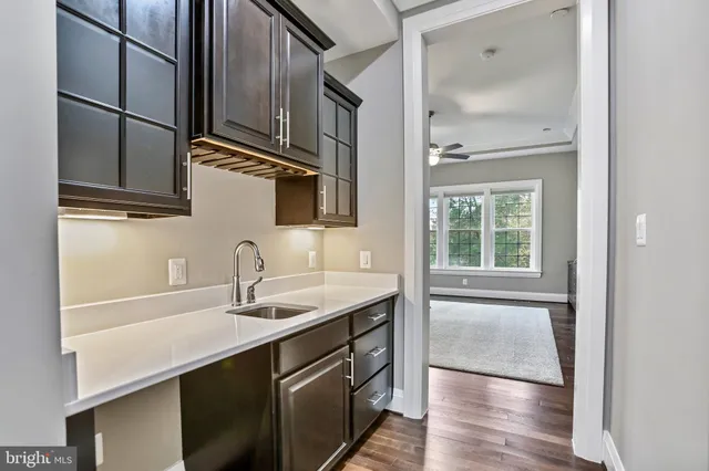 a bathroom with a sink and mirror