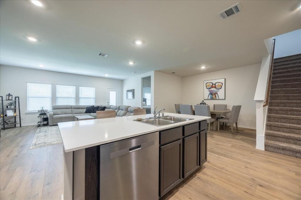 729 Amelia Court Pilot Point, TX 76258 - Photo 12 of 40 Kitchen and dining off to the right of the kitchen