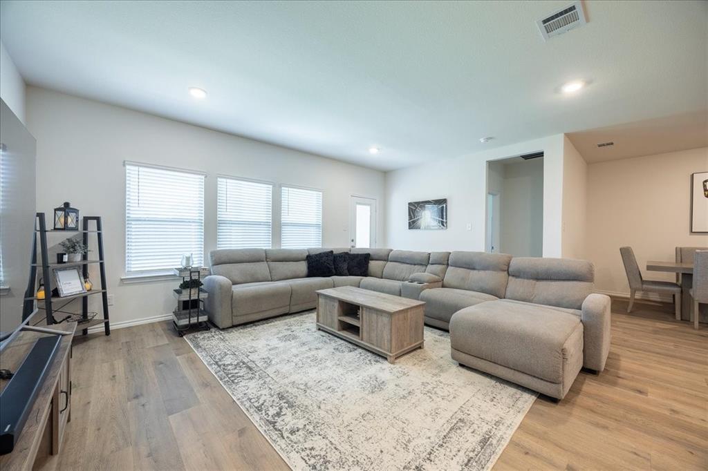 729 Amelia Court Pilot Point, TX 76258 - Photo 17 of 40 Main floor living area