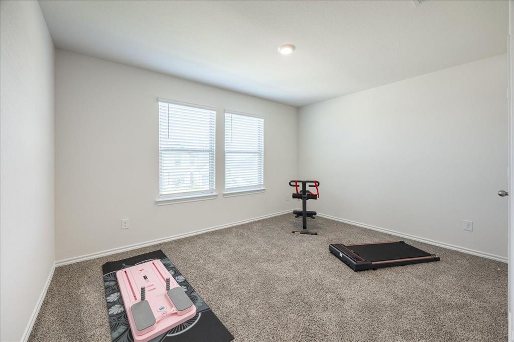 729 Amelia Court Pilot Point, TX 76258 - Photo 29 of 40 Guest bedroom 2 upstairs