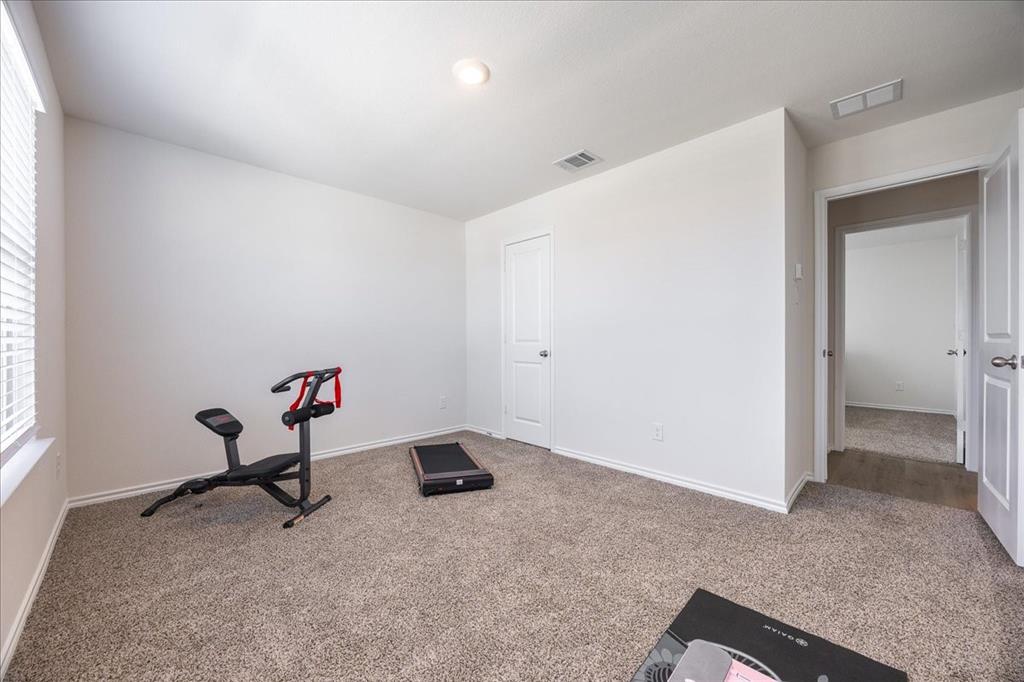 729 Amelia Court Pilot Point, TX 76258 - Photo 30 of 40 Guest bedroom 2