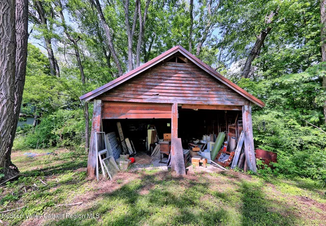 a room with a piano and wooden floor