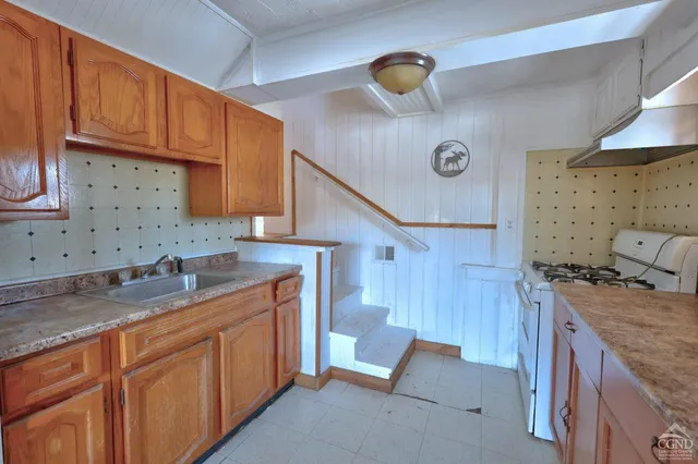 a view of a room that has a window in it