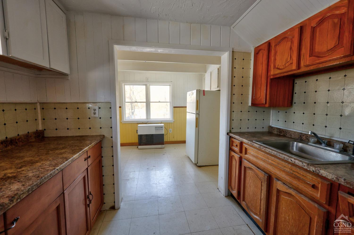 360 Stone Bridge Rd Extension East Durham, NY 12423 - Photo 29 of 83 a kitchen with stainless steel appliances granite countertop a refrigerator a stove and a sink