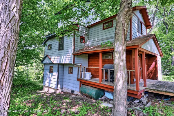 front view of a house with a small yard