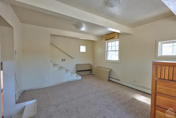 a view of a garden from a balcony