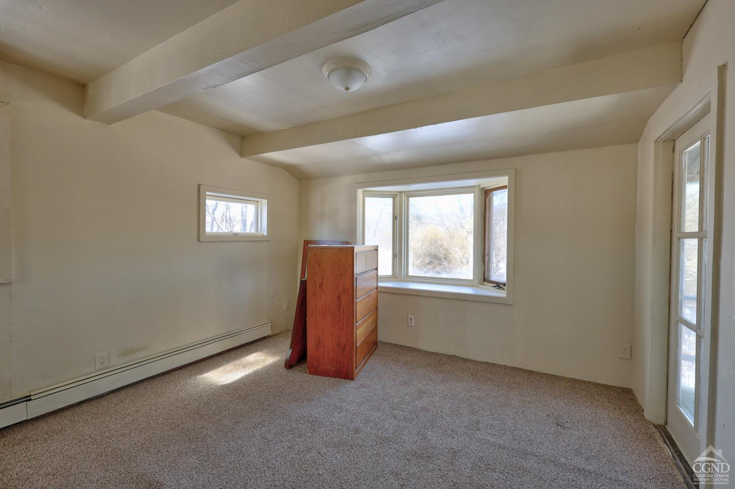 360 Stone Bridge Rd Extension East Durham, NY 12423 - Photo 36 of 83 a view of an empty room with a window