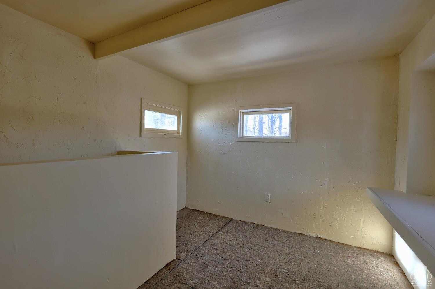 360 Stone Bridge Rd Extension East Durham, NY 12423 - Photo 50 of 83 an empty room with windows