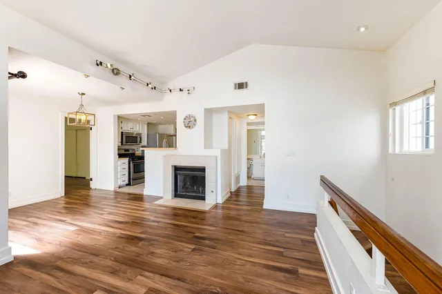 a view of livingroom with hardwood floor and a ceiling fan