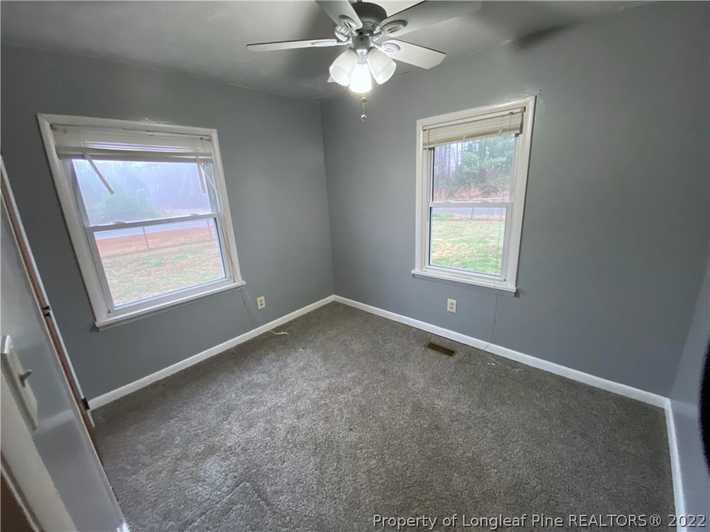 269 Azalea Drive Spring Lake, NC 28390 - Photo 11 of 13 a view of an empty room with a window