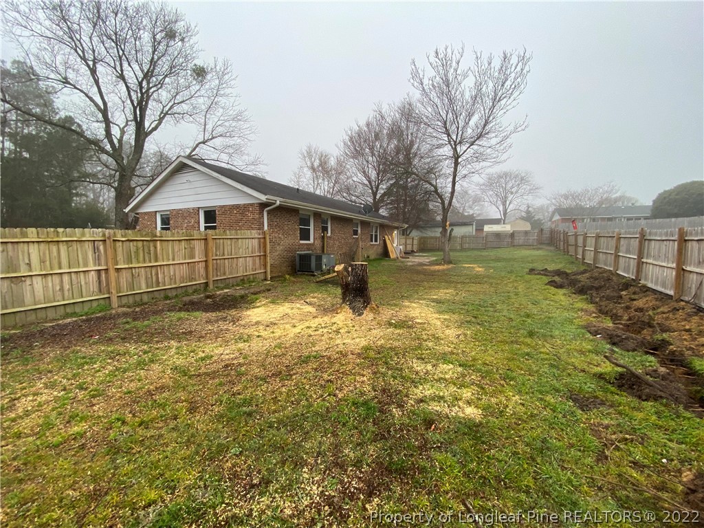 269 Azalea Drive Spring Lake, NC 28390 - Photo 13 of 13 a view of a yard with a small house