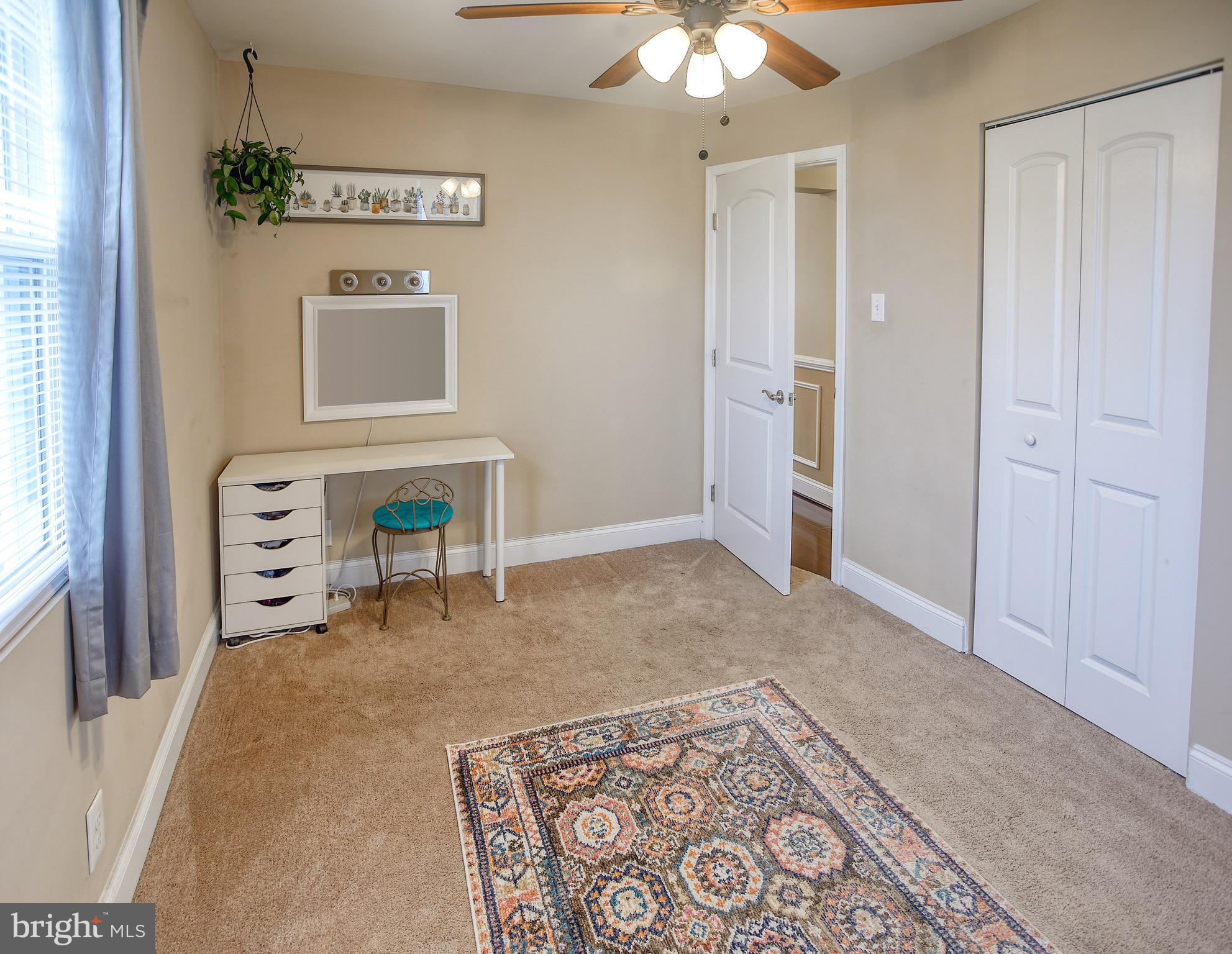 8220 Longpoint Road Dundalk, MD 21222 - Photo 15 of 22 a view of a livingroom with a table and chairs