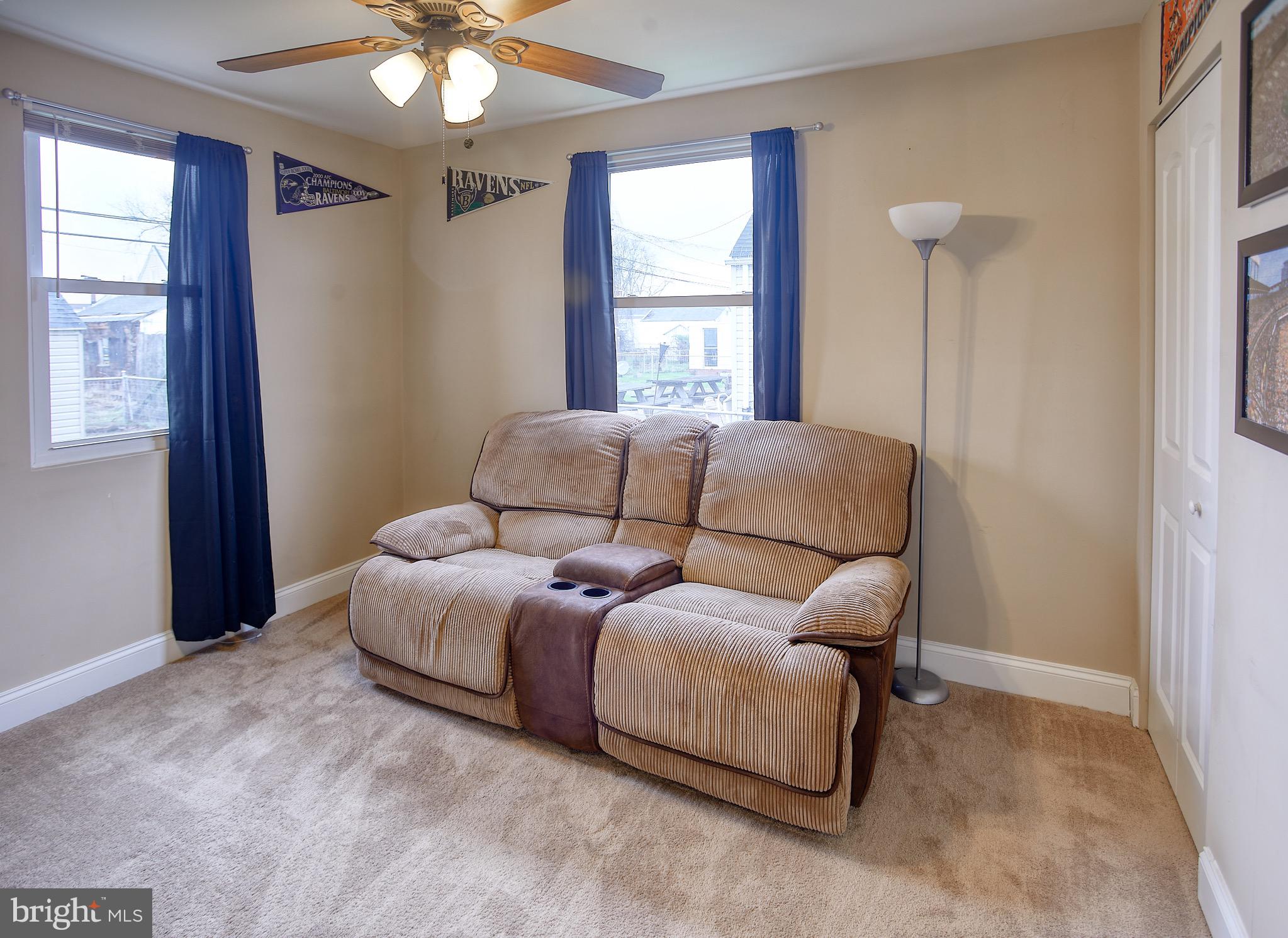 8220 Longpoint Road Dundalk, MD 21222 - Photo 17 of 22 a living room with furniture and a window