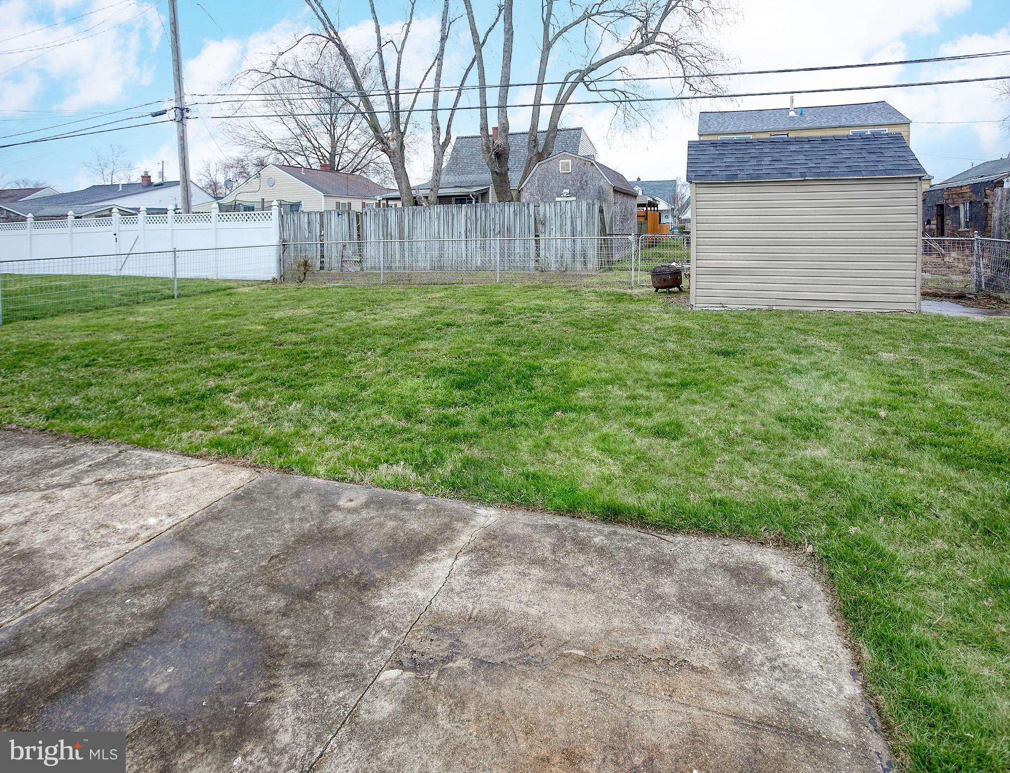 8220 Longpoint Road Dundalk, MD 21222 - Photo 4 of 22 a view of a backyard of the house