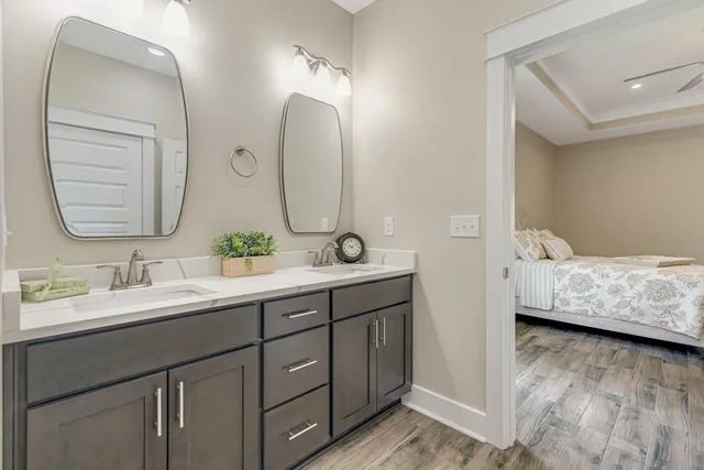 a bathroom with a tub and a sink