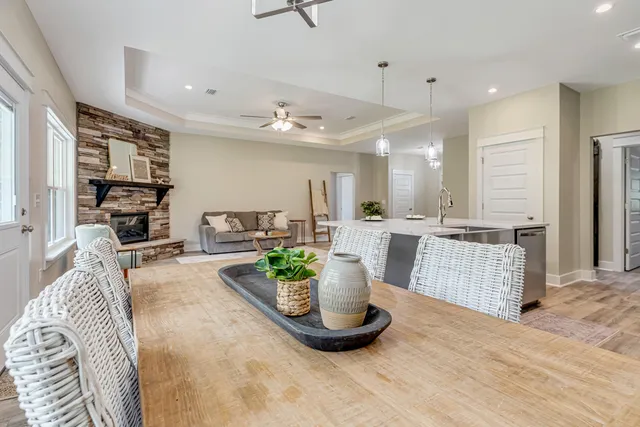 a living room with furniture and a table