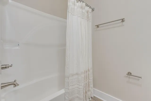 a bathroom with a bathtub