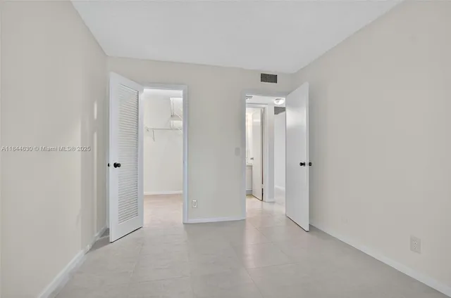 a view of a bench in the middle of a building