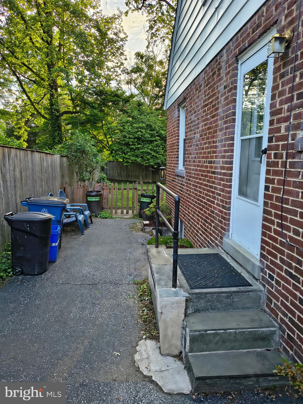 9316 Sudbury Road Silver Spring, MD 20901 - Photo 12 of 19 a view of a patio with table and chairs