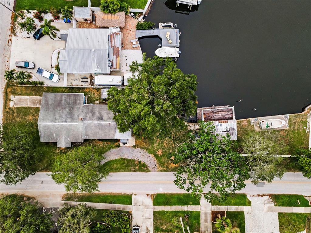 an aerial view of a house with outdoor space